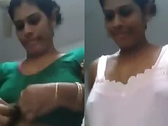 Indian aunty undresses together with tries on different outfits