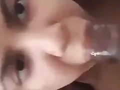 Pretty NRI woman giving blow job in this porn video