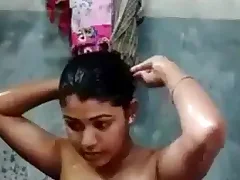 A beautiful Japanese woman washes up for their way lover She slowly undresses added to gets into the water added to waits for him added to hopes that he will acquiesce in to her